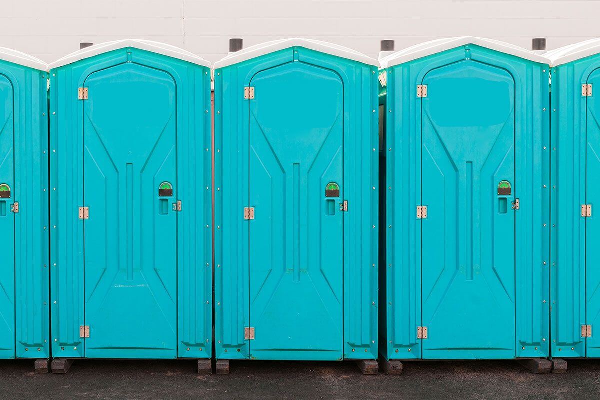 Restroom trailer interior with flushing toilet